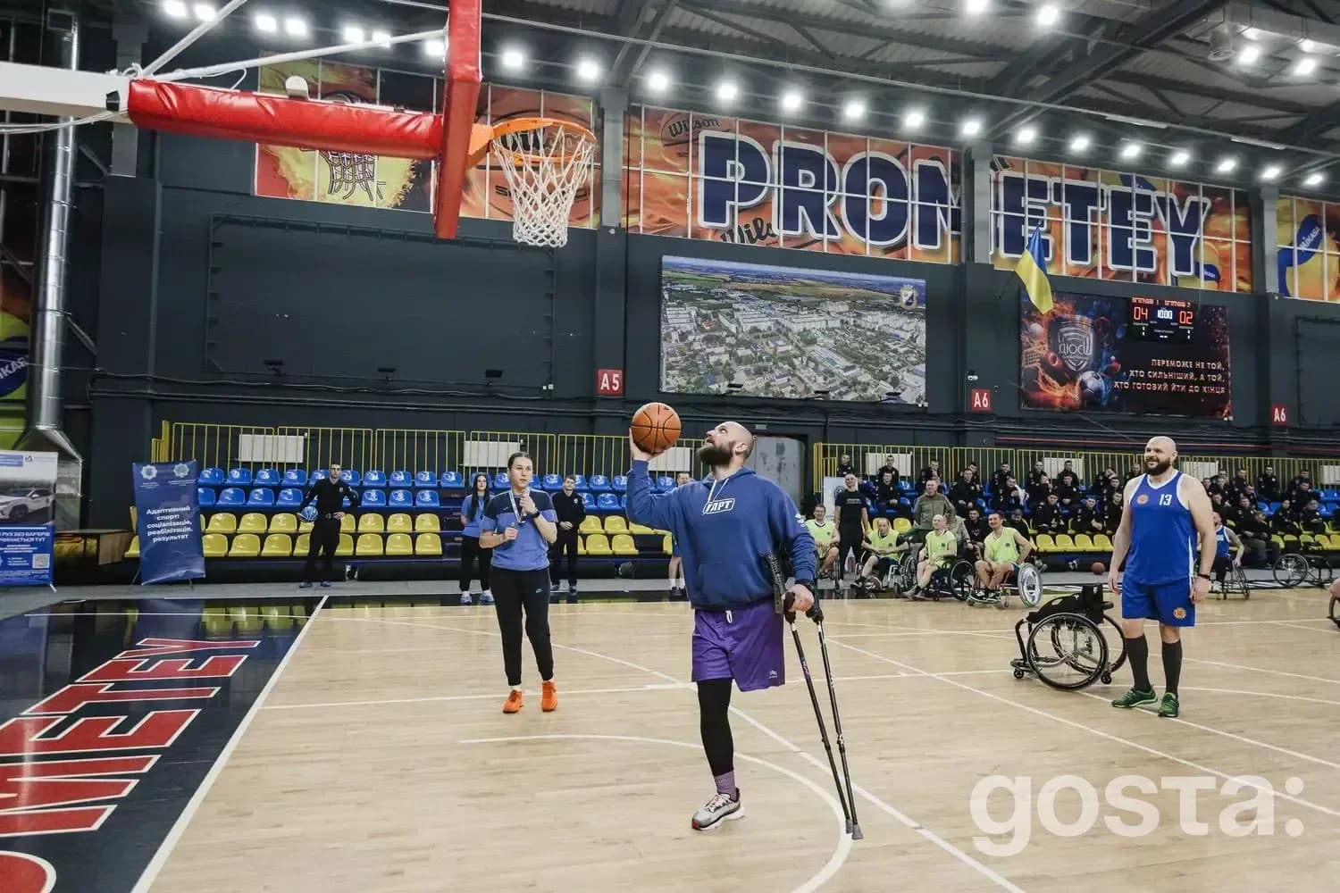 Alt text: "Veterans’ Bask team showcasing adaptive basketball skills during presentation event in Dnipro, Ukraine.
