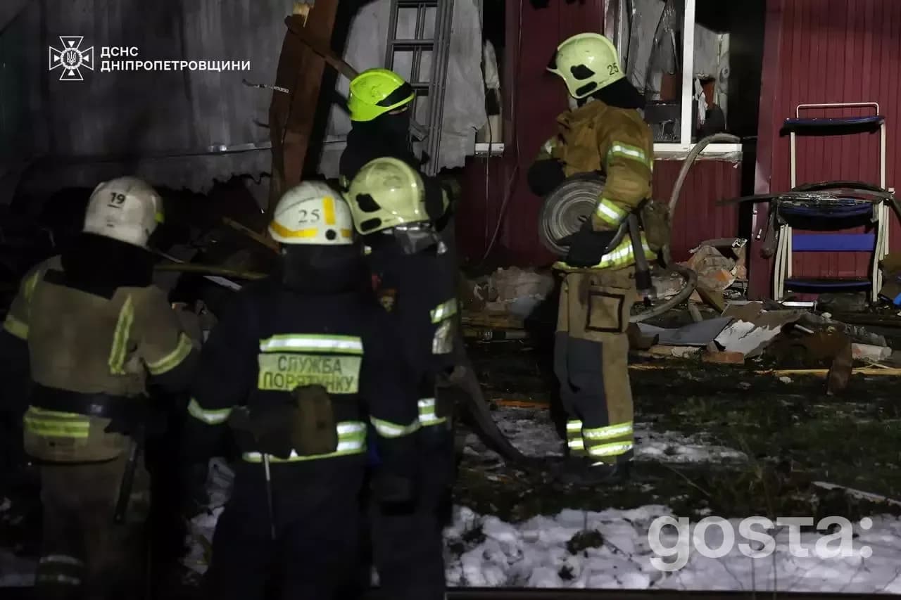 Emergency responders from Ukraine's State Emergency Service extinguishing fires after a missile attack in Dnipro, 7 Janu