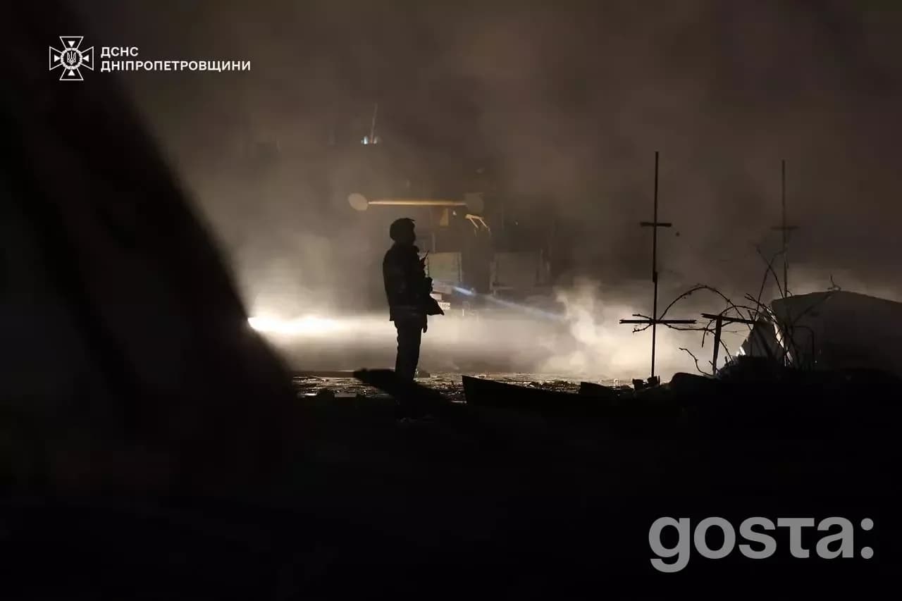 Rescue workers extinguish fires in Dnipro following a Russian attack, aiding injured civilians and assessing damage.
