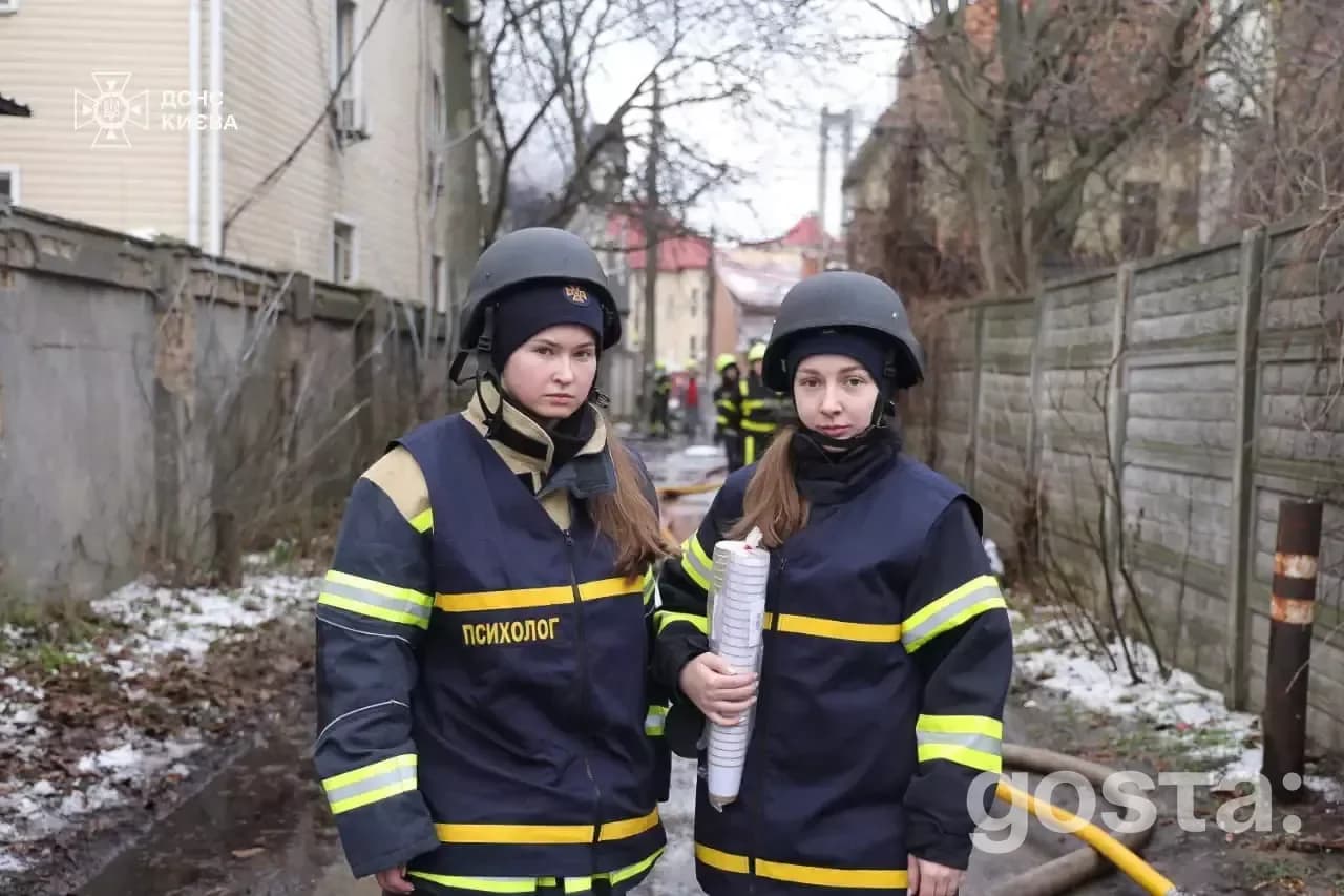 Rescue workers in Kyiv assess damage from a recent Russian attack, responding to fires and documenting the aftermath.