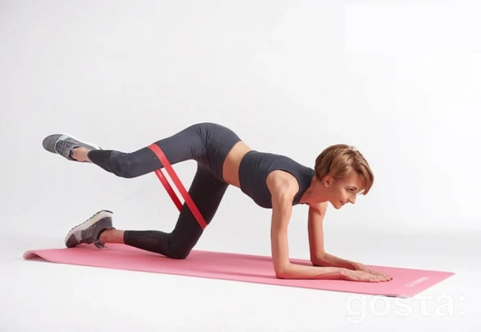 Тренування з резинками – 6 вправ для схуднення з фітнес-резинками в домашніх умовах: Махи ногою в сторону