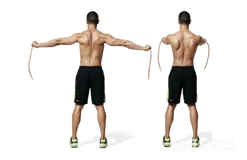Ефективні вправи з фітнес резинками для тренування вдома та в залі: Розведення рук