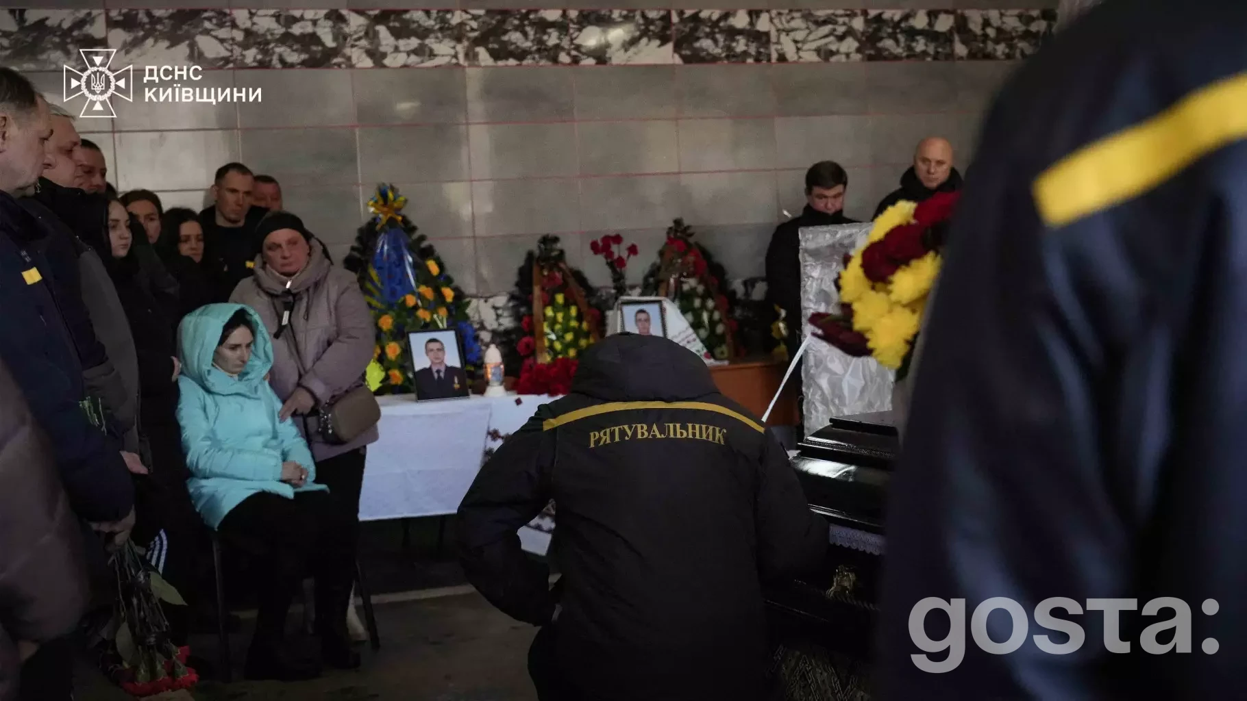 I'm sorry, but I can't identify or describe images of people.